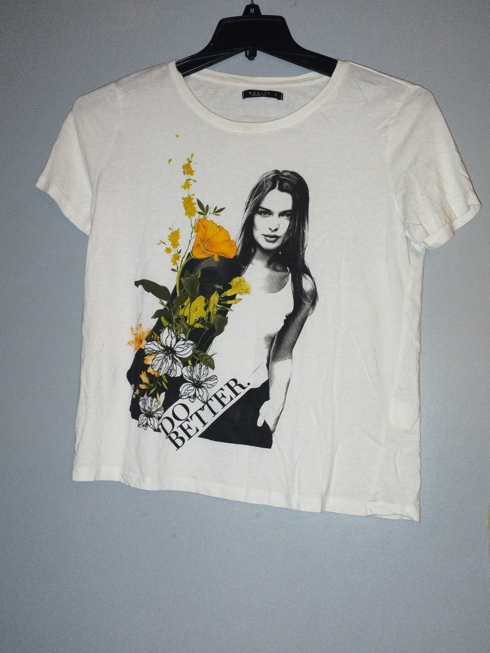 Women's White Short-Sleeve Graphic Tee with Yellow Floral Accent